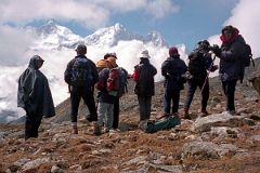 19 Our Trekking Group On Shao La Watching As Makalu And Chomolonzo Starts To Come Out Of The Clouds.jpg